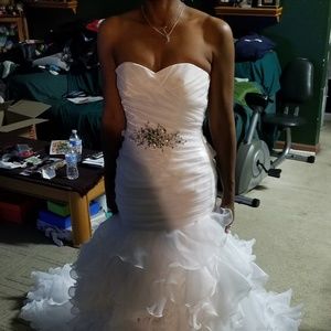 Beautiful white corset back wedding gown